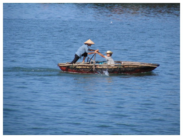 Oarsman at Halong Bay